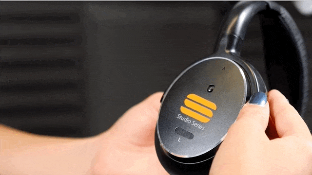 Gif shows someone enabling the noise cancelling switch on a pair of ANX-10 Headphones.