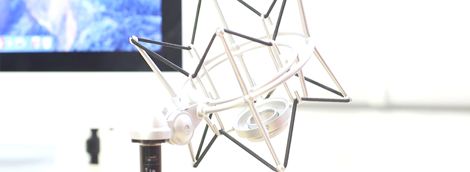 This is a stock image of a silver and white Stand & Shockmount