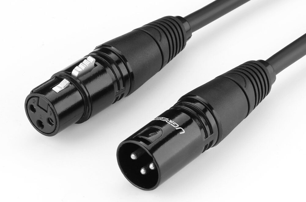 This is a close up image of two XLR to XLR Cables (Male to Female). They are black and the background is plain white.